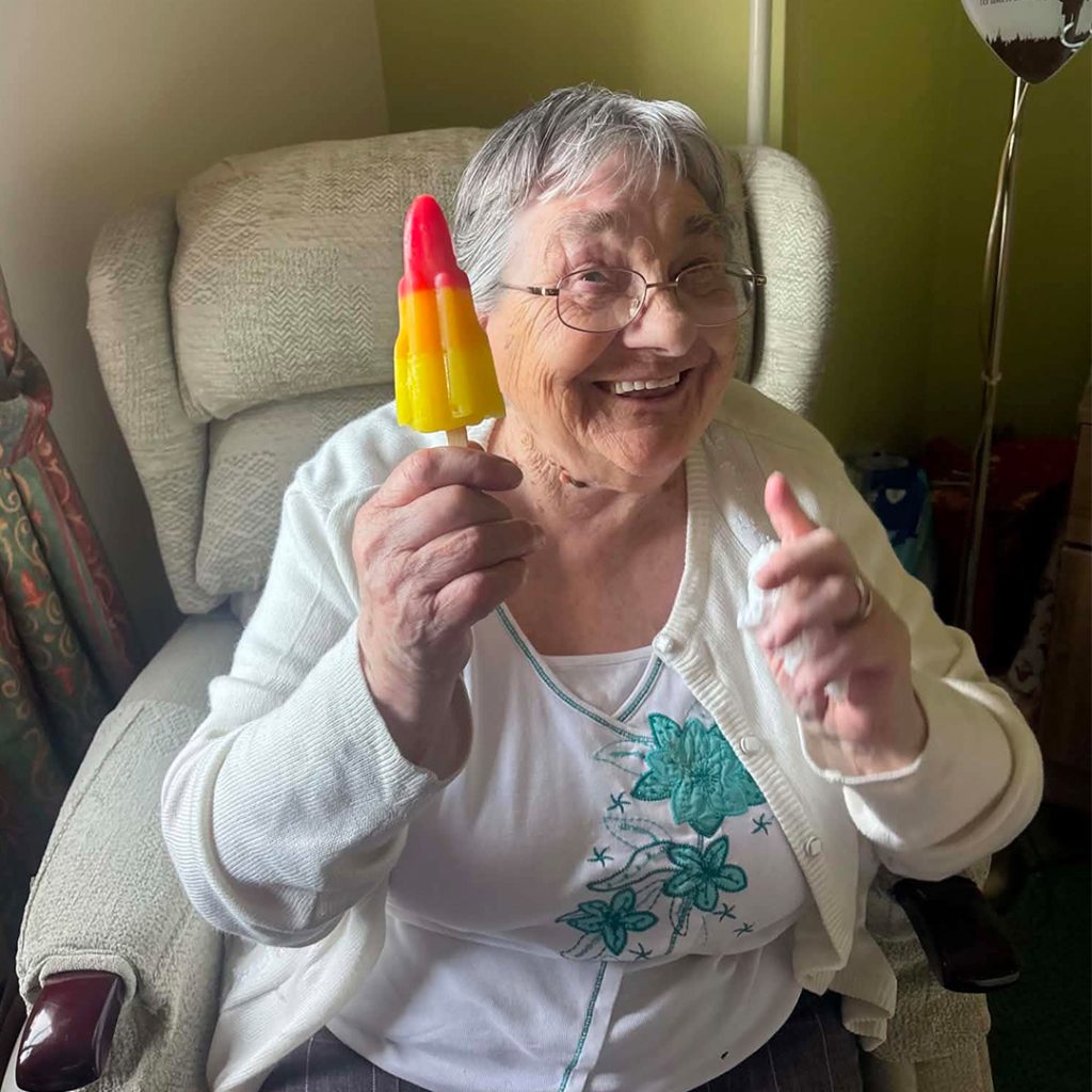 Residents enjoy ice lollies as temperatures rise at Lower Johnshill